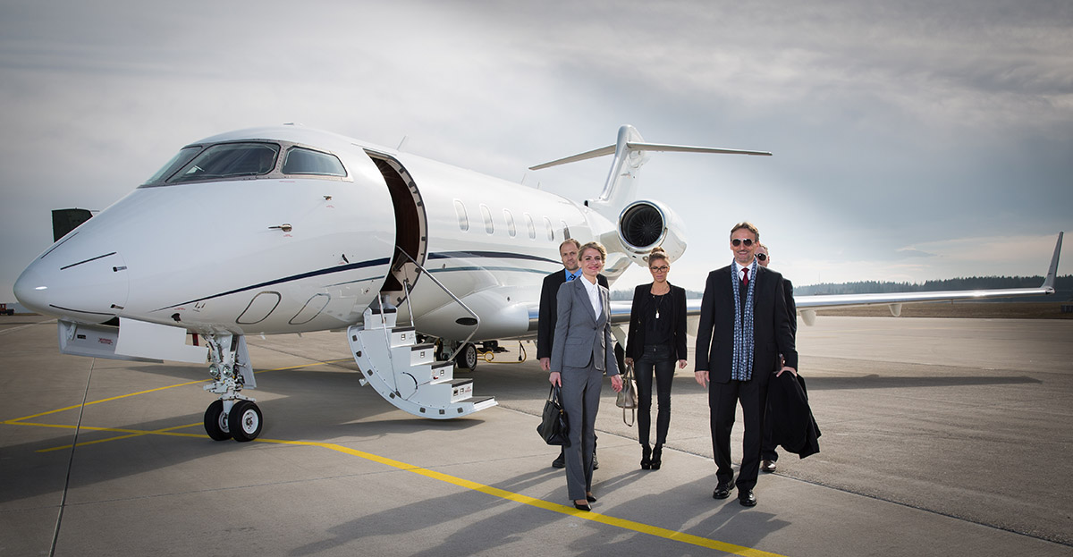 executive business team leaving corporate jet